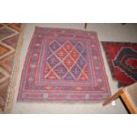 A Gazak rug with geometric designs, 104 x 121cms.
