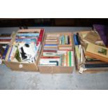 A collection of books, large format hardbacks, paperbacks; etc., various subjects, in three boxes.