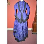 A Victorian purple and black silk jacket and skirt (waist altered);