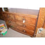 A George III mahogany chest of two short and two long drawers fitted brass wreath handles,