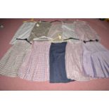 A collection of Aquascutum skirts of various check designs, sizes 8,