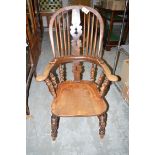 A 19th Century elm seat Windsor chair,