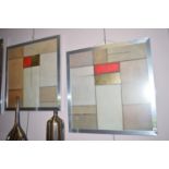 A pair of modernist panel pictures decorated in red, buff and gilt, in silver coloured frames.