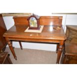 A late Victorian oak side table, fitted drawer and the rectangular top with truncated corners,