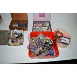 A large quantity of costume jewellery; watches; amber type necklaces; etc.