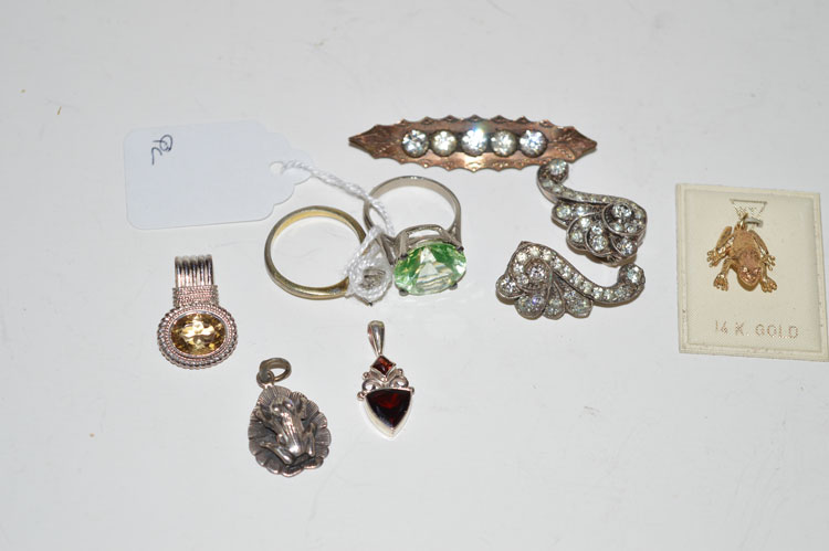 A quantity of costume jewellery, including: gem set rings; brooches; etc; and a 14ct.