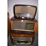 Three vintage radios, makers Phillips, Bush and Raymond.