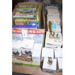 A box of Giles cartoon books; together with twelve boxed 'Giles Family' figurines.