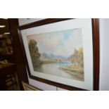 A watercolour - "On the Coquet", by F.W. Reaveley, signed.