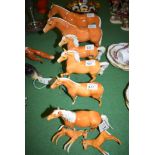 A collection of eight Beswick Palomino horses and foals,