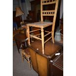 An HMV gramophone within associated walnut cabinet; together with two bedroom chairs;