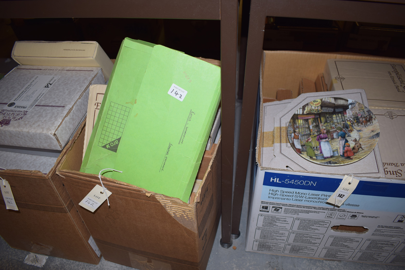Three boxes containing a large collection of collectors' plates, still in original boxes.