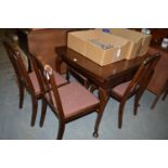 A mid 20th Century mahogany dining suite table;