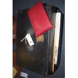 A black painted wooden deed box containing a friendship album with leather cover;