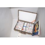 A mid 20th Century mahjong set in fitted case.