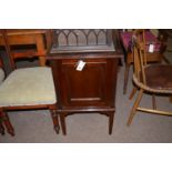 An early 20th Century stained wood gramophone cabinet.