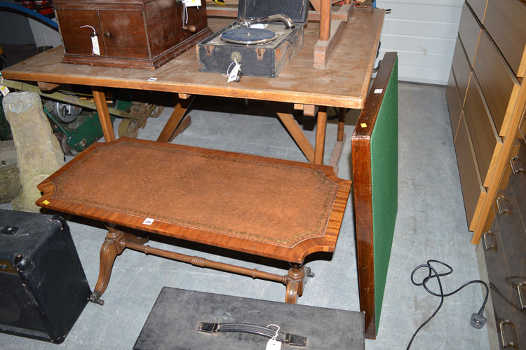 A reproduction rectangular mahogany occasional table with brown leather insert;