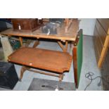 A reproduction rectangular mahogany occasional table with brown leather insert;
