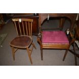 A stained wood piano stool with hinged box seat; together with a spindle back dining chair.