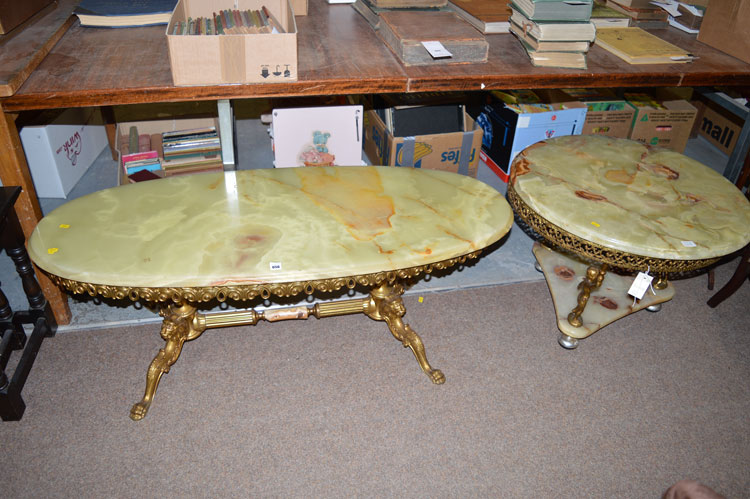 Two onyx top occasional tables on metal bases.