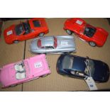 A collection of five 1/18 scale model vehicles comprising; a Ferrari 456GT, a Mercedes 300SL,