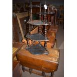 An early 20th Century oak drop leaf dining table,