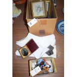 A box containing miniature picture frames; a pair of white coloured leather spats;