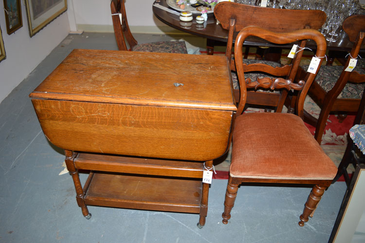 An oak drop-leaf three-tier tea trolley; together with a Victorian single chair.