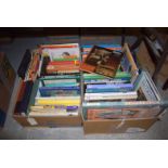 Two boxes of assorted hardback books,