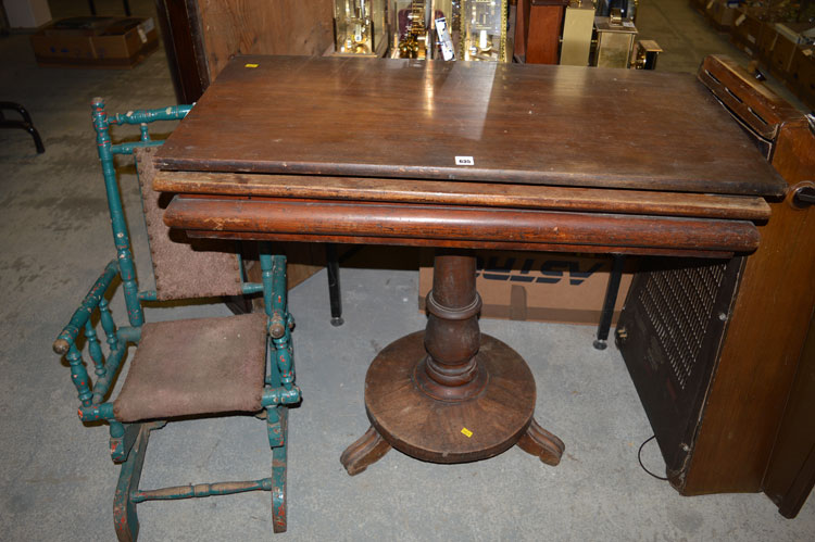 A 19th Century mahogany turnover top table;