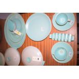 Poole pottery part dinner service, comprising: a pair of tureens, two graduating meat plates,