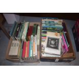 Two boxes of boxes of gardening books.