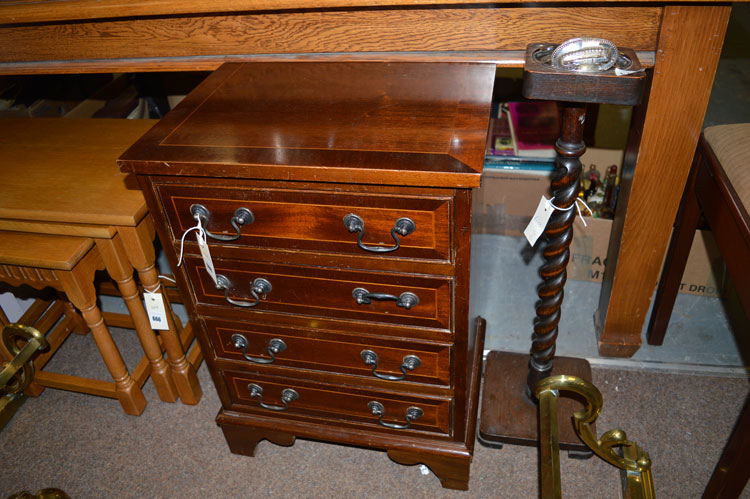 A reproduction inlaid mahogany miniature chest of four long drawers;