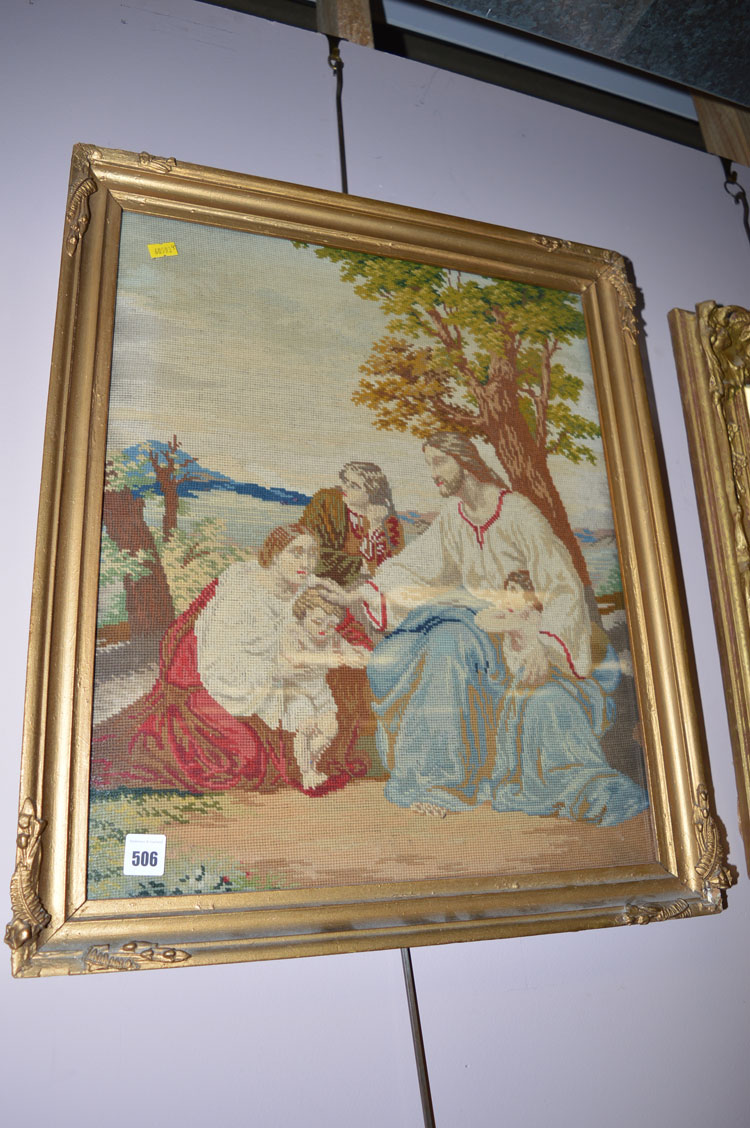 A Victorian woolwork picture showing Jesus Christ blessing a child.