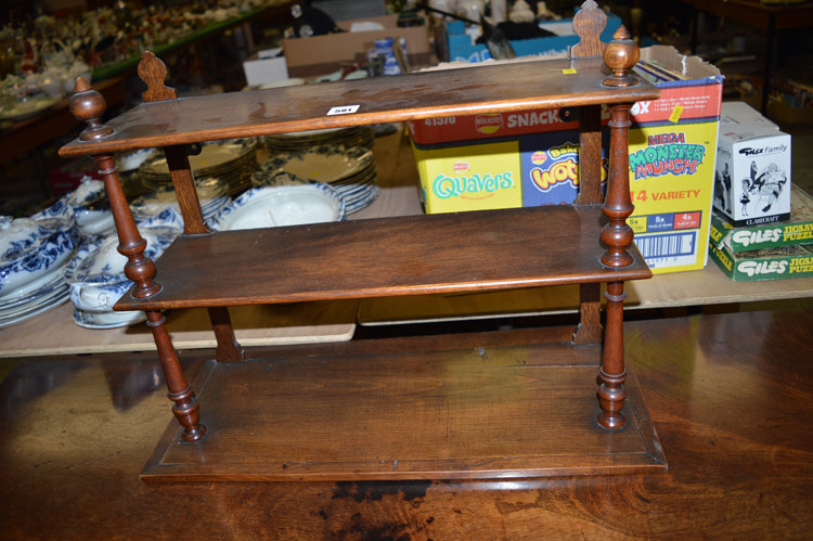 An early 20th Century mahogany open shelf unit.