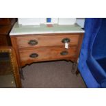 An early 20th Century washstand fitted two long drawers.