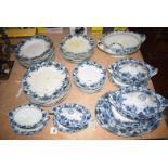 A Victorian Persian design dinner service decorated with blue floral borders,