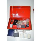 A quantity of costume jewellery in a safety box.