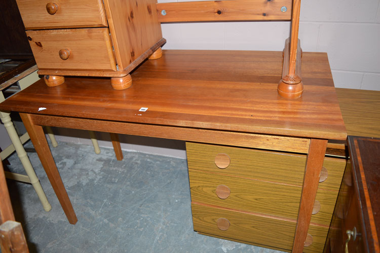 A stained wood table, the rectangular top raised on square tapering legs.