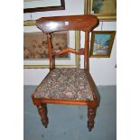 A set of six mid-19th Century mahogany dining chairs with drop-in seats and splat backs,