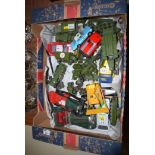 A collection of mostly Dinky die-cast military vehicles and other die-casts; and model racing cars,