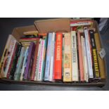 A box of cookery books.