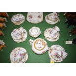An early 20th Century Shelley salon tea set, comprising: twelve cups, saucers and plates,