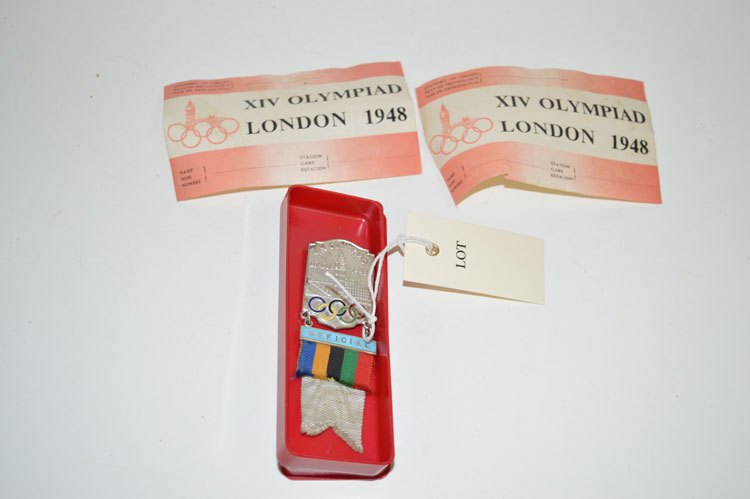 A 1948 London XIV Olympiad Officials medal, with label and luggage labels.