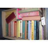 A box of hardback books,