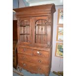A stained pine cabinet,