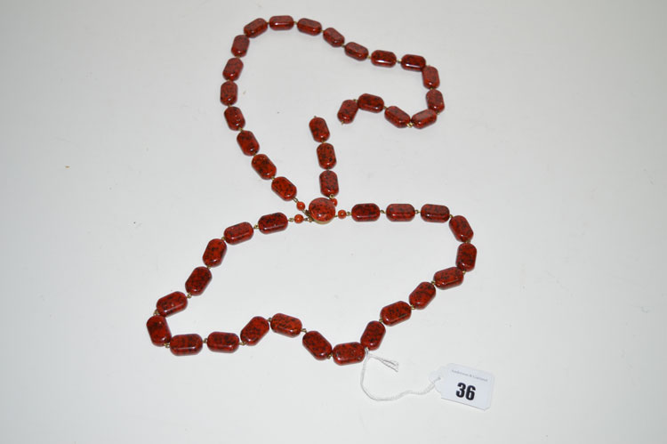 A Scottish hardstone double row necklace.