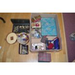 A quantity of costume jewellery in various jewellery boxes.