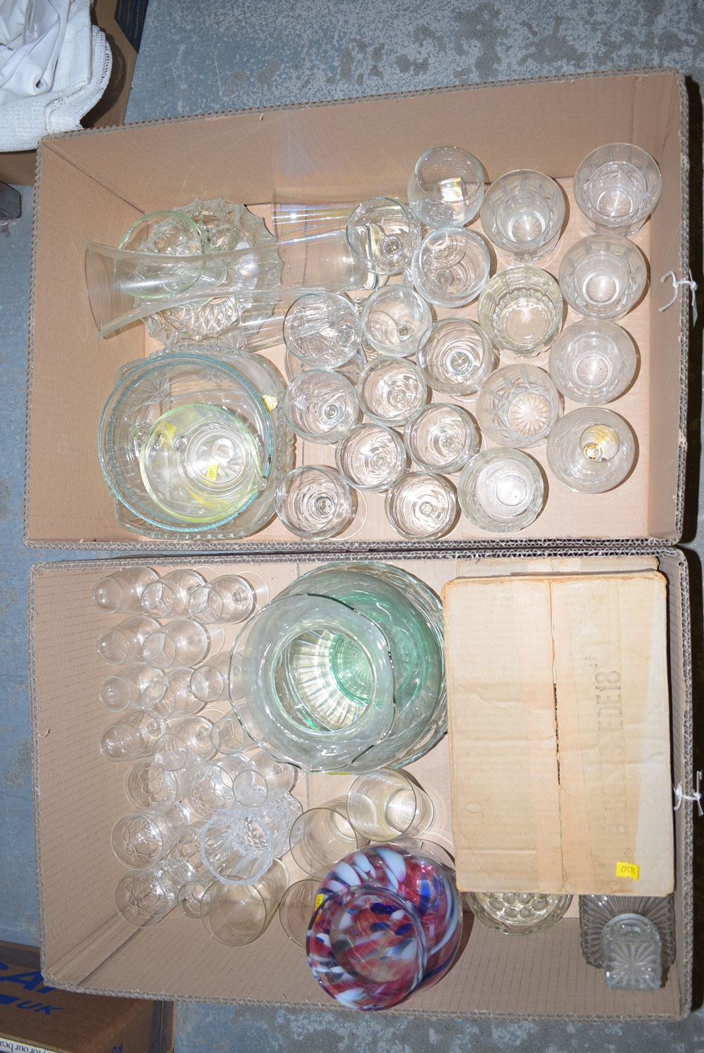 Two boxes of assorted wine glasses; vases; etc.
