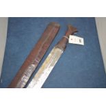 A North African short sword with double sided blade, zig-zag design on the fuller,